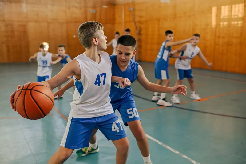Youth basketball players in a game