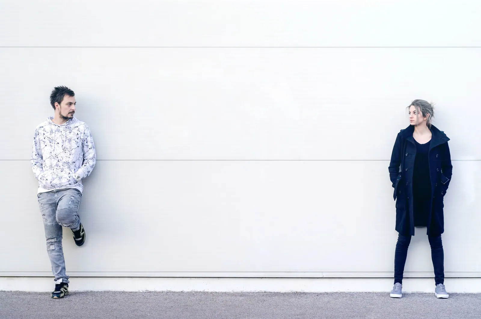 Young man and woman looking at each other