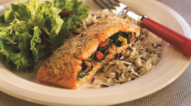 Spinach-stuffed baked salmon