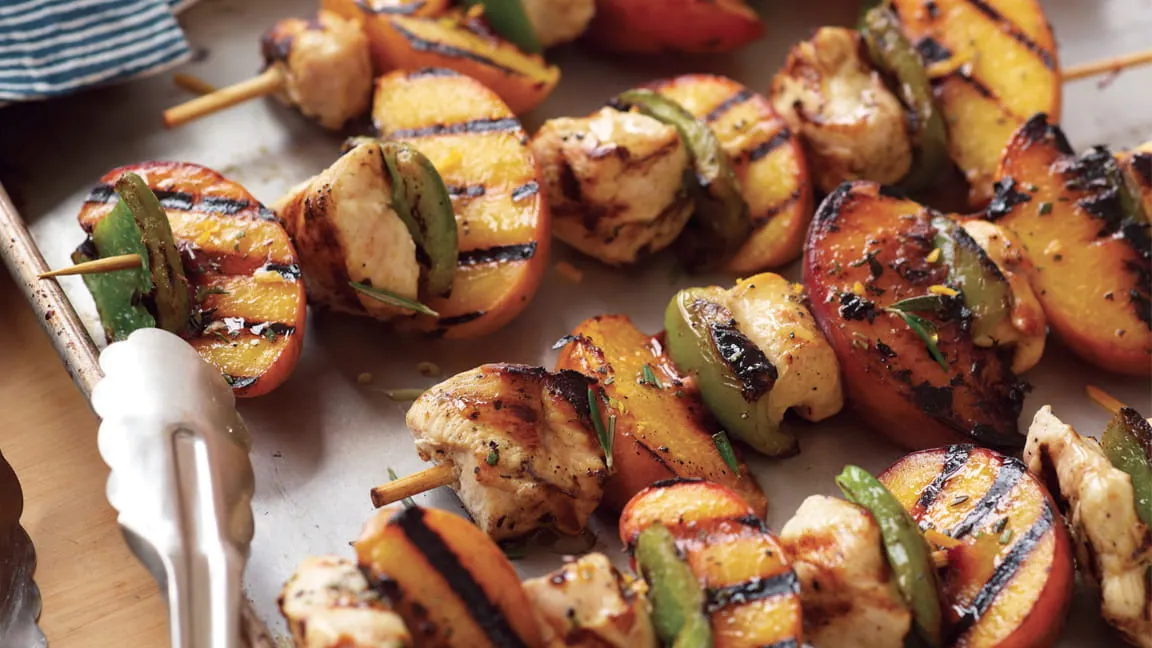 Chicken and peach kebabs on the grill